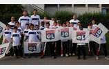 Les U11 porte drapeau lors de la rencontre OL / Lorient